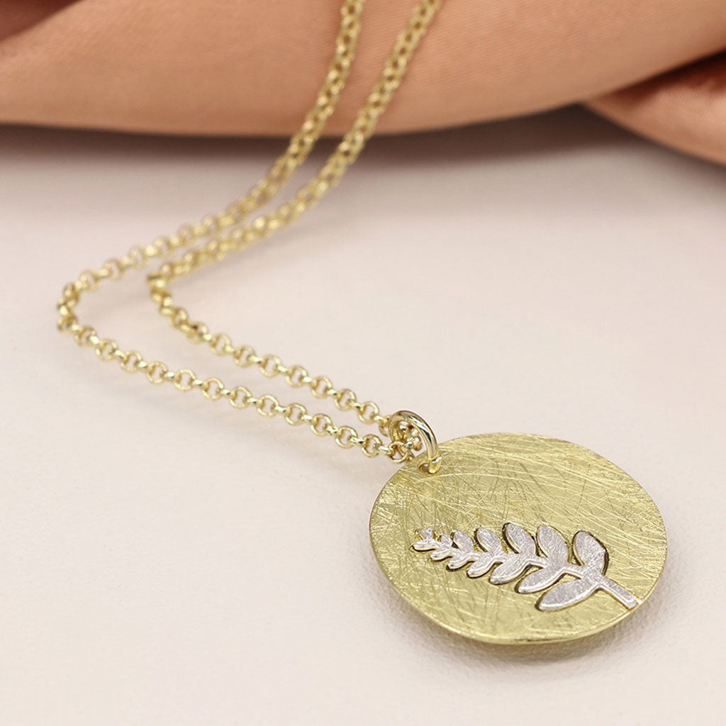 Faux Gold Scratched Disc Necklace With Silver Plated Fern Inlay