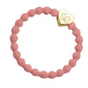 Bracelet élastique coeur doré sur champagne rose